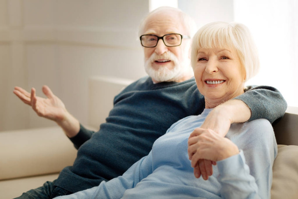 Delighted elderly people looking at camera - Foto, afbeelding