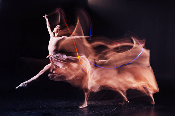 Skillful flexible woman showing dance positions - Foto, Imagen