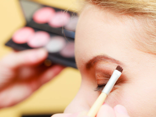 Close up woman getting make up, eyebrows - Φωτογραφία, εικόνα