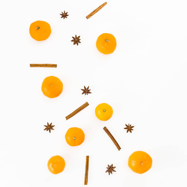 fir branches and tangerines  on white background. Flat lay. Top view - Valokuva, kuva