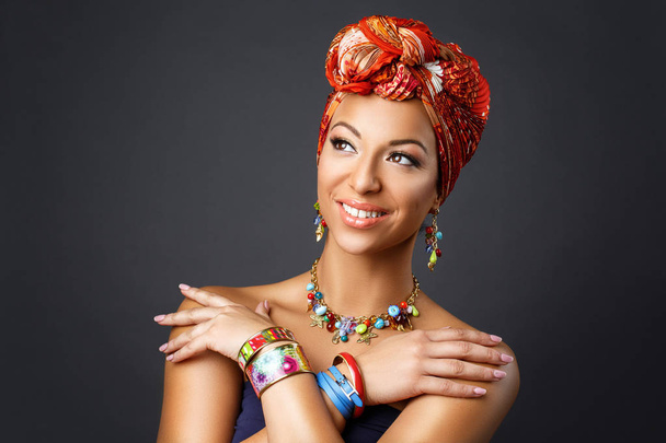 beautiful mulatto young woman with turban on head - Фото, зображення
