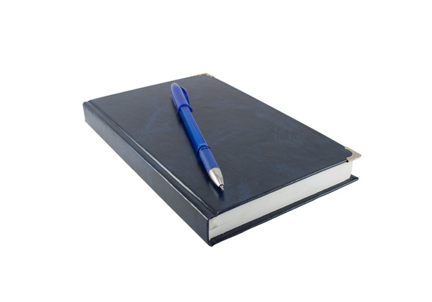 Ручка лежит на блокноте
 - Фото, изображение
