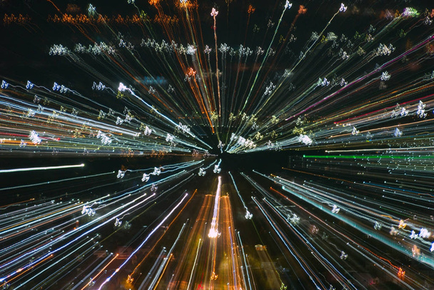 light lines with long exposure,  speed motion abstract background in the dark night ,  blast zoom effect , zoom burst of light in the city - Photo, Image