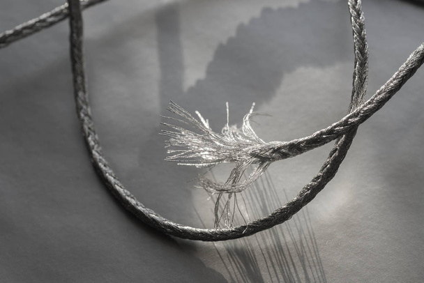 silver twine on silver  background - Photo, Image