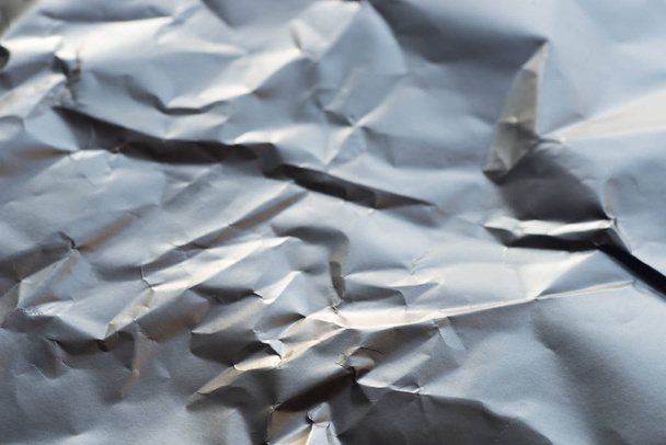 stříbrná zmačkaný papír textury pozadí  - Fotografie, Obrázek