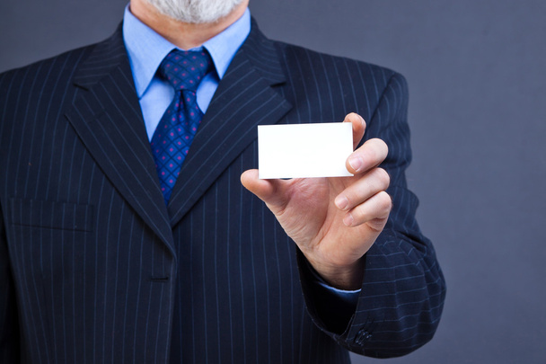 Business man holding blank card - Foto, Imagen