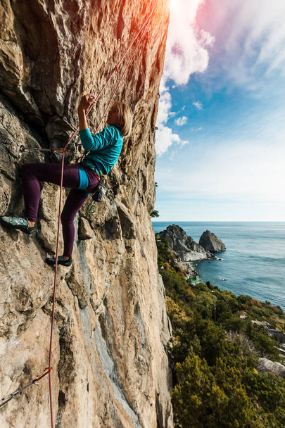 A rock climber on a wall. - Photo, Image