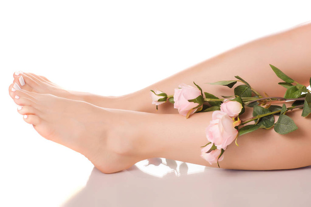 Female feet heel flowers - Foto, afbeelding