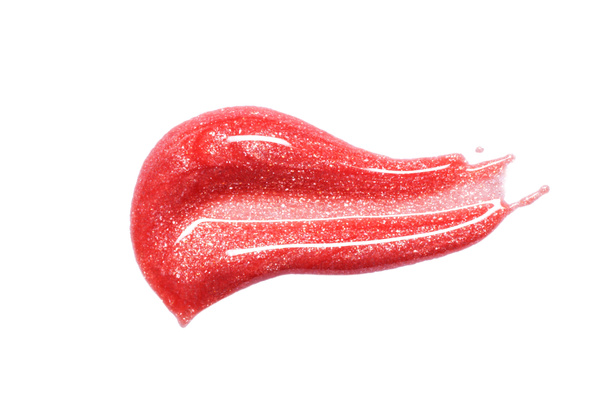 Échantillon de brillance des lèvres isolé sur blanc. Lèvres roses tachetées
. - Photo, image