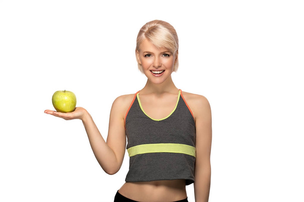 Woman holding apple - Foto, Imagen