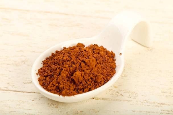 Cocoa powder in bowl - Photo, Image