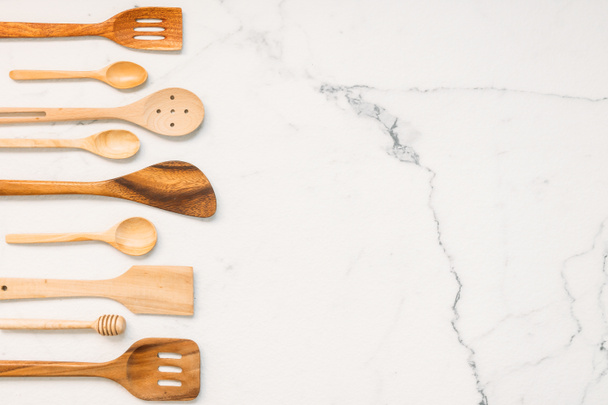 Kitchen utensils with copy space on white marble stone background - Photo, image