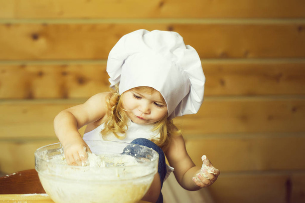 happy boy child cook kneading dough - 写真・画像