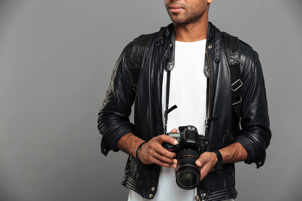 Cropped image of a young african male photographer - Foto, immagini