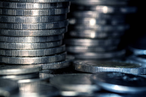 Close up silver money coin stacking on dark background - Foto, Bild