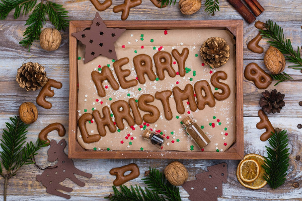 Christmas cookies on wooden tray - Valokuva, kuva