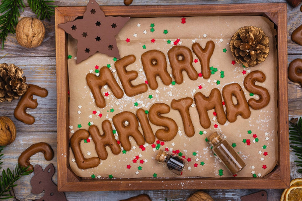 Christmas cookies on wooden tray - Foto, afbeelding