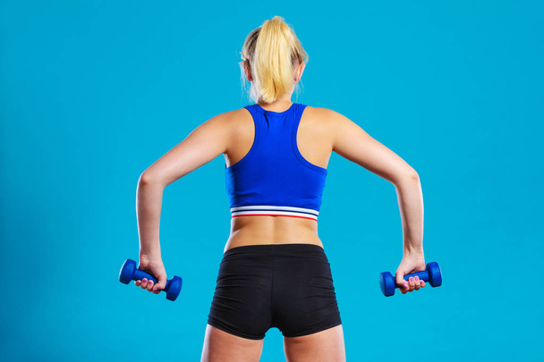 Fit woman lifting dumbbells weights - Φωτογραφία, εικόνα