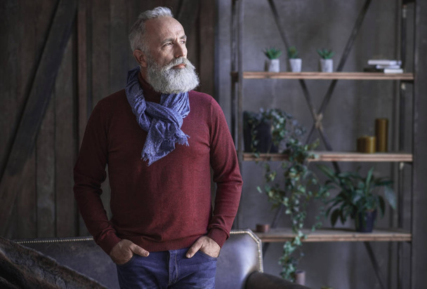 Serene beard retire male standing in apartment - Fotografie, Obrázek