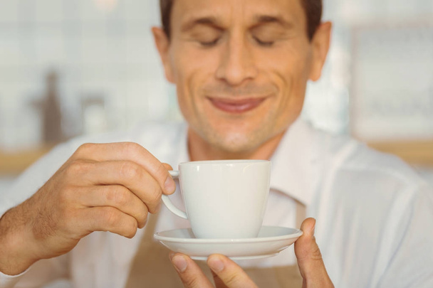 Selective focus of a cup with delicious drink - Фото, изображение