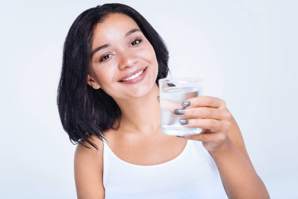 woman posing with a glass of water - Fotó, kép
