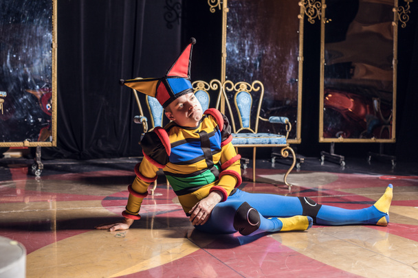 Actor dressed jester's costume in interior of old theater.  - Fotoğraf, Görsel
