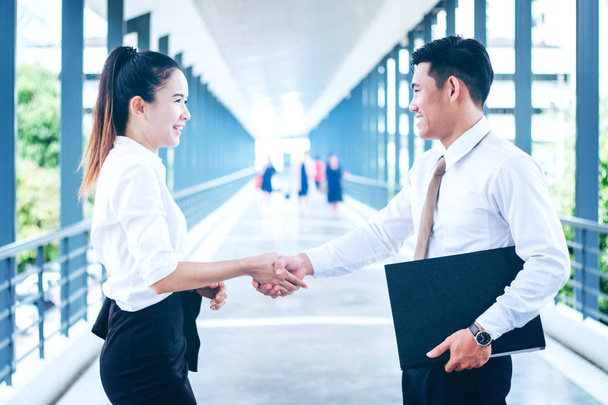Business partnership handshaking after striking deal outdoors at - Foto, imagen