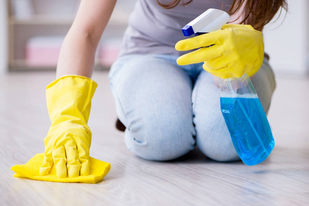 Woman doing cleaning at home - Φωτογραφία, εικόνα
