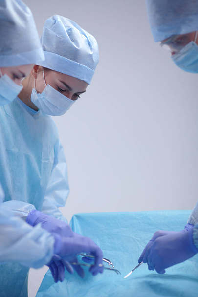 Team surgeon at work in operating room. - Fotoğraf, Görsel