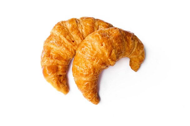 čerstvě pečené croissanty na bílém pozadí, pohled shora - Fotografie, Obrázek