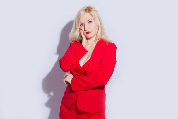 Beautiful, sexy, elegant blonde female model in red suit - Φωτογραφία, εικόνα