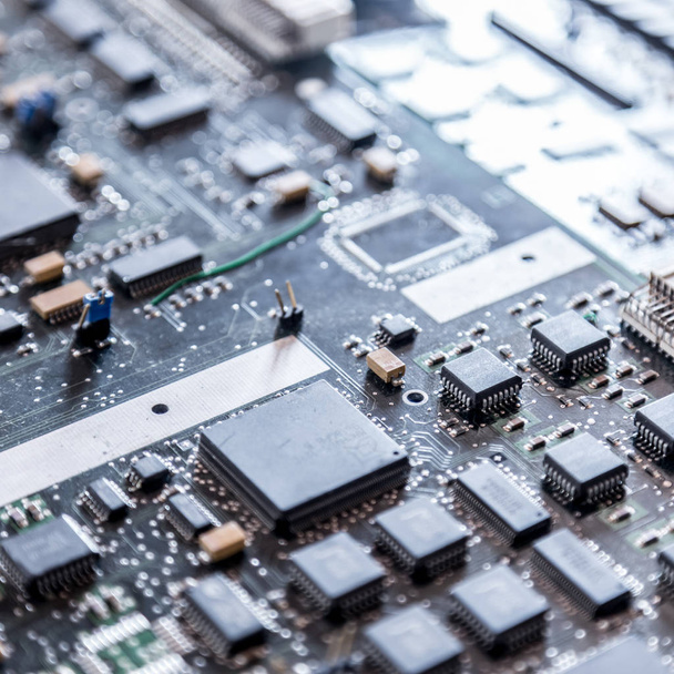 Close up of electronic circuit board. - Foto, Bild