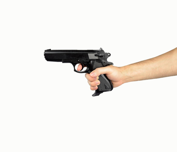 hand with a gun - Photo, Image