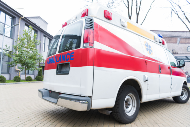 ambulance white and red car on street  - Фото, зображення