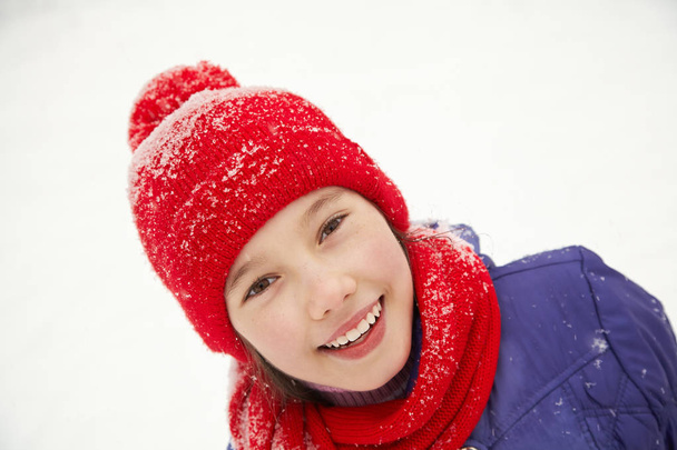 portrait of a cute girl in the winter - Photo, Image