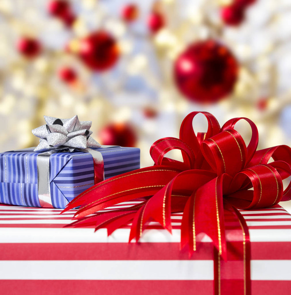 Gift box with ribbon on bokeh background for christmas and new year with clipping path - Photo, Image