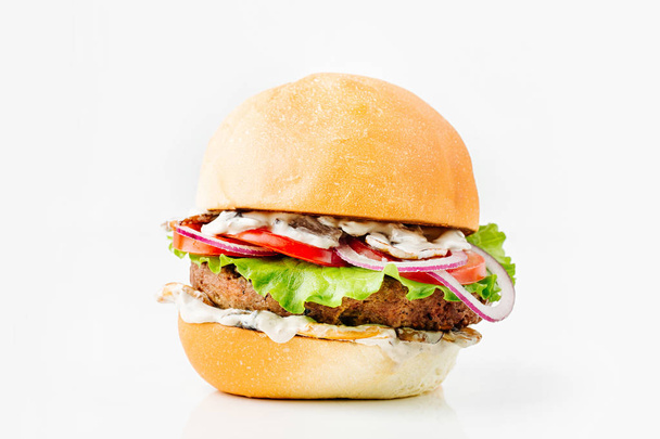 delicious Burger With Beef, Tomato, Cheese, Lettuce and Onion isolated on white background - Foto, Imagen
