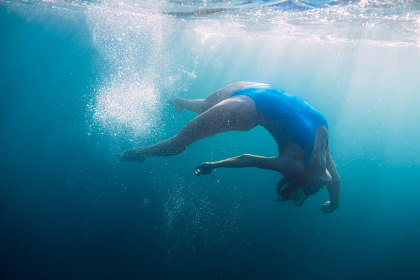 Woman  floating in quiet ocean. - Foto, Imagem