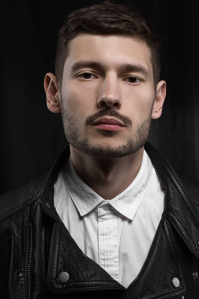 Male portrait in leather jacket in studio - Photo, Image
