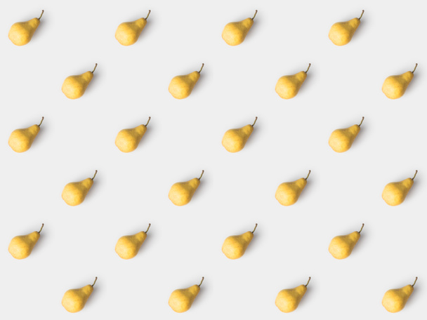 pattern of delicious yellow pears isolated on white - Foto, afbeelding