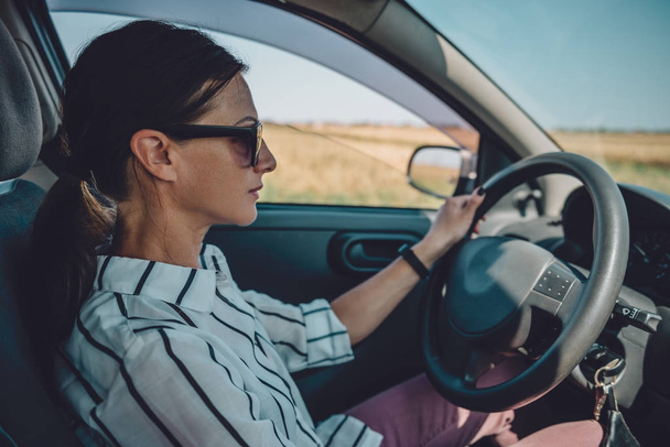 Woman driving car - Photo, image