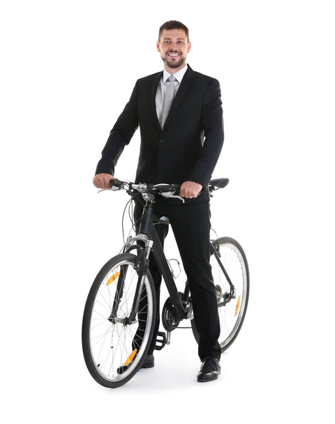 Handsome businessman with bicycle  - Zdjęcie, obraz