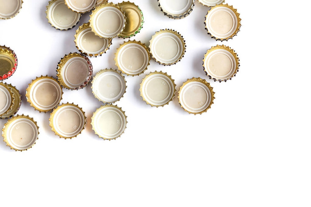 caps of beer on white background - Foto, imagen