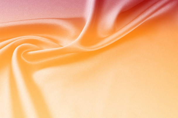 Tekstuuri kankaan tausta. Punainen keltainen hupullinen beige silkki fabri
 - Valokuva, kuva