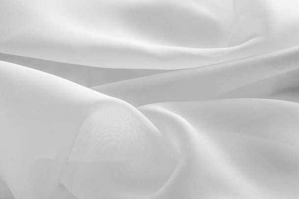 Texture, background, pattern. Silk fabric is transparent, white  - Photo, Image