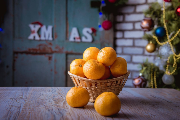 tangerines in the basket. - Фото, зображення