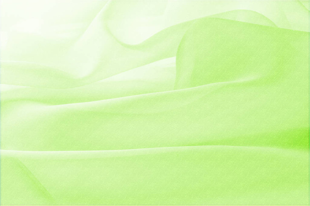 Tekstury, tła, wzór. Tkanina z jedwabiu jest przezroczysty, zielony. - Zdjęcie, obraz