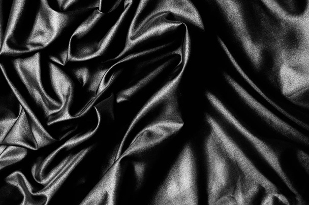 Textuur, achtergrond, patroon. Zwarte zijde stof. Stof zijde ela - Foto, afbeelding