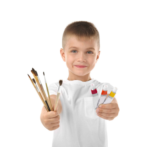little boy with paints and brushes - Fotó, kép