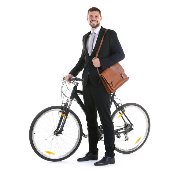 Handsome businessman with bicycle  - Zdjęcie, obraz